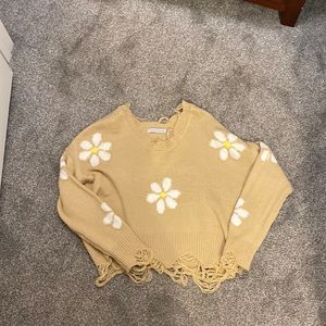 Distressed daisy sweater
